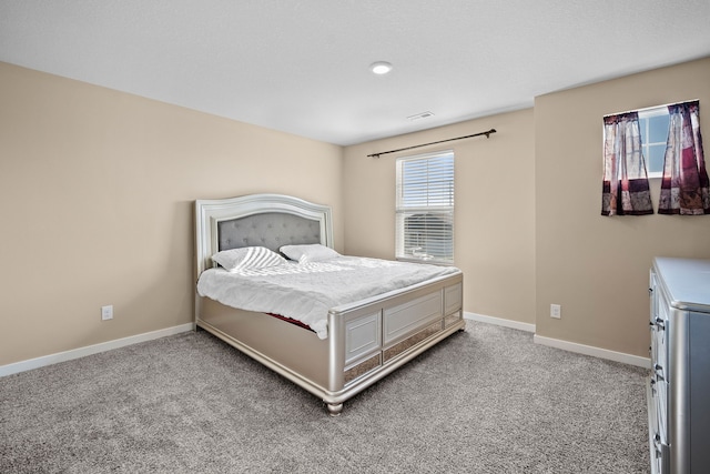 5506 145th St, Urbandale, IA 50323 - bedroom with carpet and baseboards