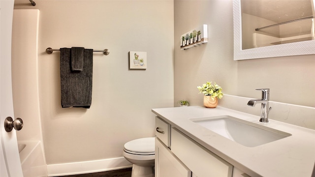full bath featuring toilet, vanity, and shower / bathtub combination