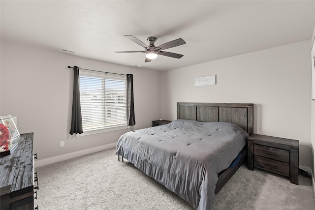 17127 Blue Sage Ln, Urbandale, IA 50323 - carpeted bedroom featuring baseboards and ceiling fan