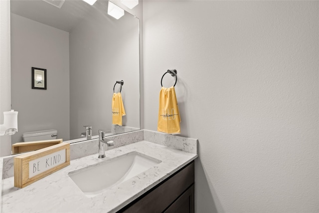 17127 Blue Sage Ln, Urbandale, IA 50323 - half bath with vanity and toilet