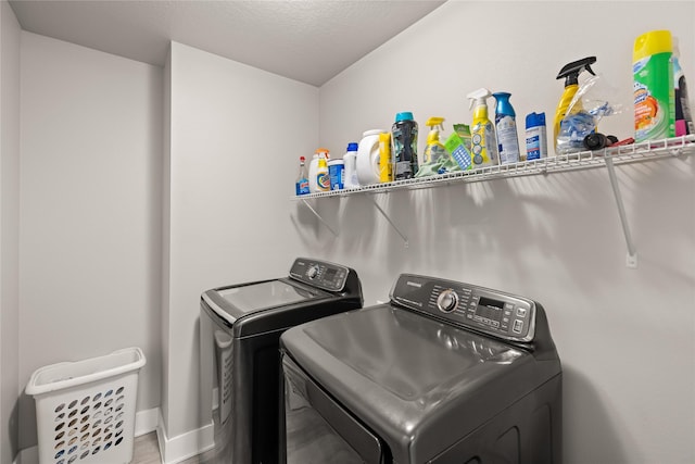 17127 Blue Sage Ln, Urbandale, IA 50323 - laundry room featuring separate washer and dryer