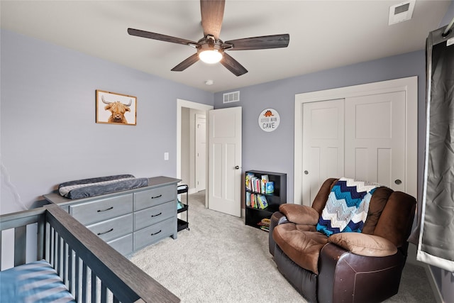 17127 Blue Sage Ln, Urbandale, IA 50323 - bedroom with carpet flooring, a closet, and a ceiling fan