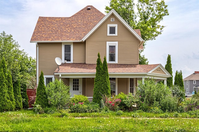 301 N 4th St, Marshalltown, IA 50158 - view of front of house with covered porch and a shingled roof