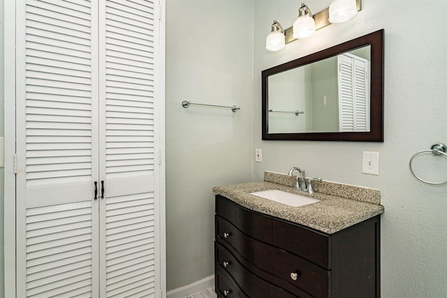 301 N 4th St, Marshalltown, IA 50158 - bathroom featuring a closet and vanity