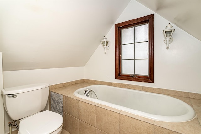 301 N 4th St, Marshalltown, IA 50158 - bathroom featuring lofted ceiling and a bath
