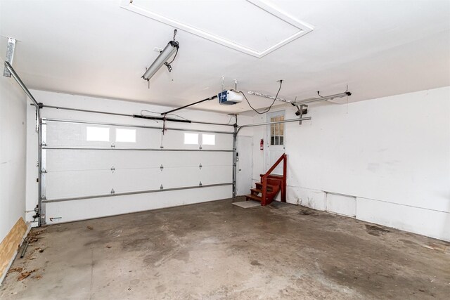 301 N 4th St, Marshalltown, IA 50158 - garage featuring a garage door opener