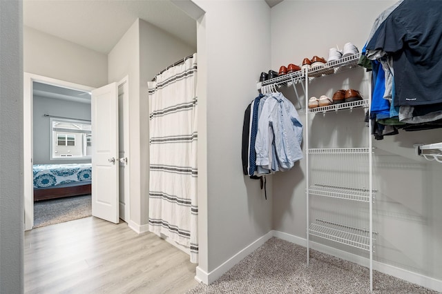 2424 N 7th Ave E, Newton, IA 50208 - spacious closet with wood finished floors