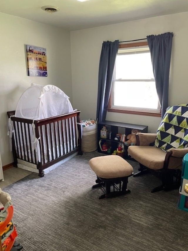 320 1st Ave, Grinnell, IA 50112 - bedroom with carpet flooring