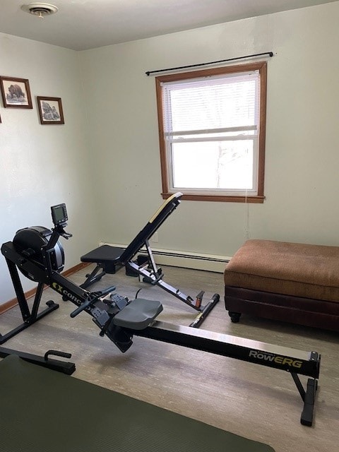 320 1st Ave, Grinnell, IA 50112 - workout area with a baseboard heating unit and baseboards