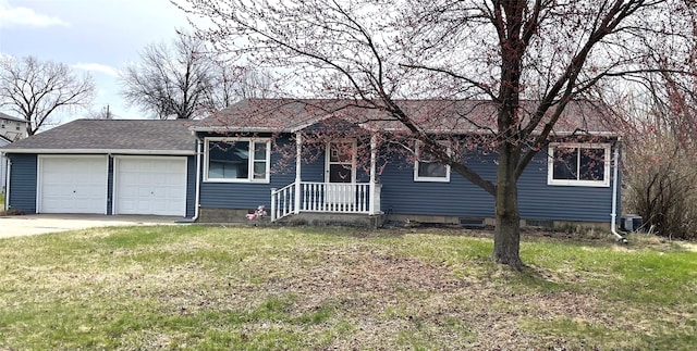 320 1st Ave, Grinnell, IA 50112 - ranch-style house with a garage, a front lawn, concrete driveway, and roof with shingles