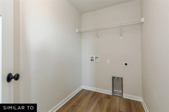 1012 Willow Valley Dr, Norwalk, IA 50211 - laundry room with washer hookup, wood finished floors, electric dryer hookup, laundry area, and baseboards