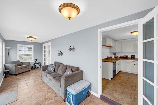 308 Pine St, Williams, IA 50271 - living room with light tile patterned floors and baseboards
