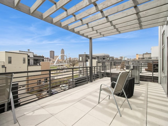 804 E 2nd St, Des Moines, IA 50309 - view of patio / terrace featuring a city view, a balcony, and a pergola