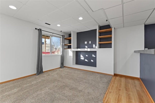 400 Coral Ridge Blvd, Pleasant Hill, IA 50327 - interior space with baseboards and a paneled ceiling