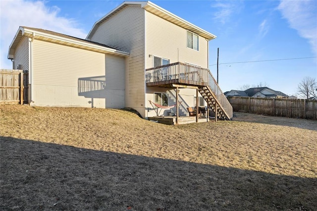 400 Coral Ridge Blvd, Pleasant Hill, IA 50327 - back of property featuring fence, a wooden deck, stairway, and a patio area