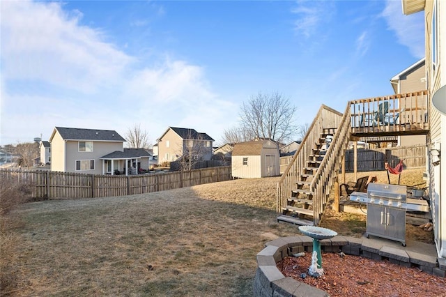 400 Coral Ridge Blvd, Pleasant Hill, IA 50327 - view of yard featuring an outdoor structure, stairs, a fenced backyard, and a storage shed
