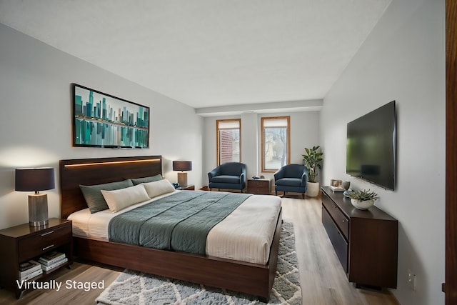 bedroom featuring wood finished floors
