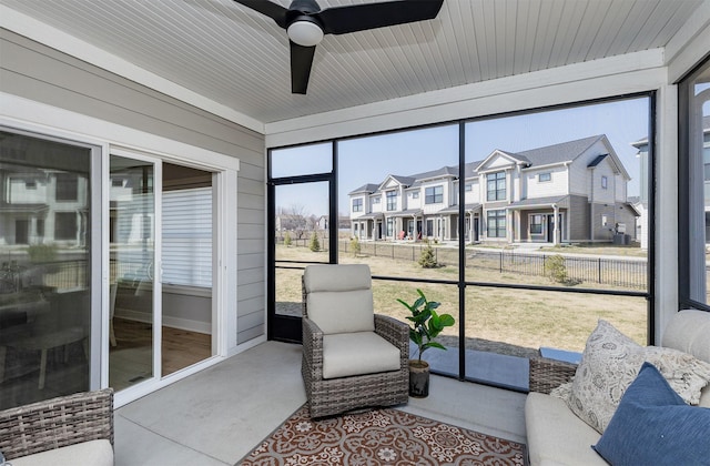 2426 SW Vineyard Ln, Ankeny, IA 50023 - sunroom featuring a healthy amount of sunlight, a residential view, and ceiling fan