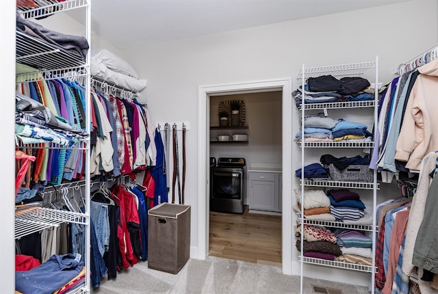 2426 SW Vineyard Ln, Ankeny, IA 50023 - spacious closet featuring carpet