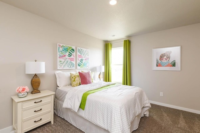 14521 Ironwood Ct, Urbandale, IA 50111 - bedroom with dark carpet, baseboards, and visible vents