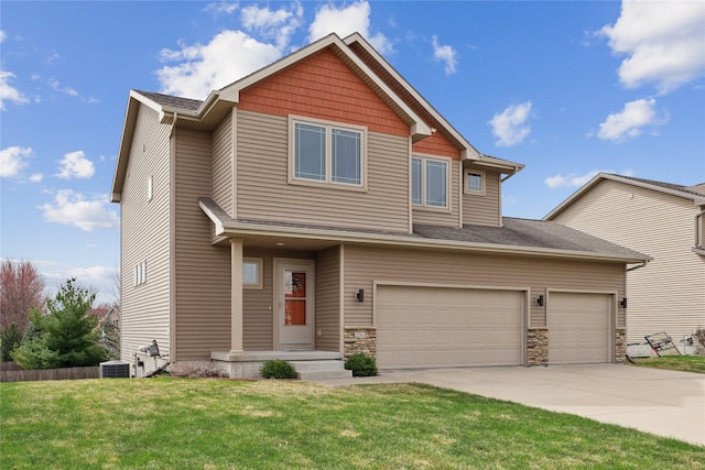250 NE Fox Run Trl, Waukee, IA 50263 - view of front of home featuring central air condition unit, a front lawn, concrete driveway, and stone siding
