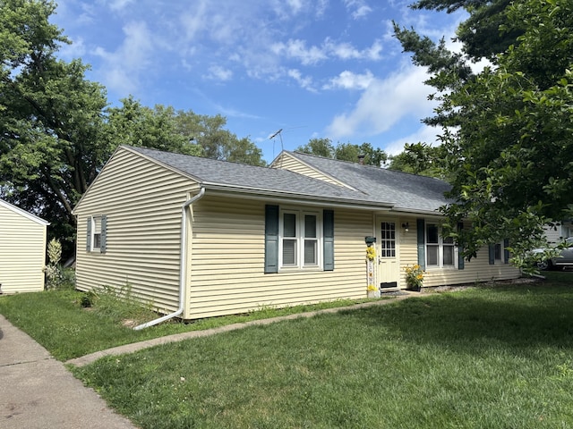 1032 69th St, Windsor Heights, IA 50324 - single story home with a front lawn and roof with shingles