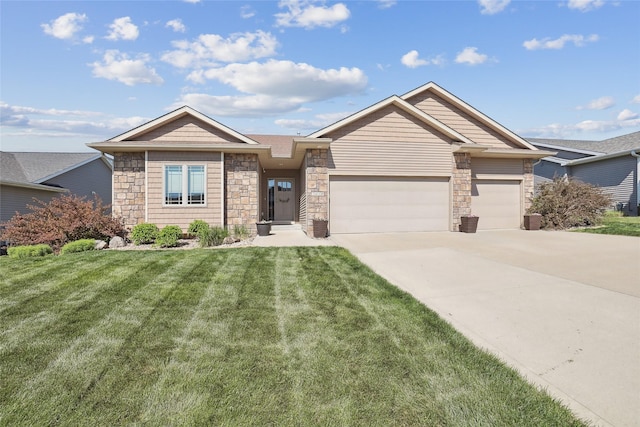 2610 Long Ave, Van Meter, IA 50261 - ranch-style home with a front yard, a garage, concrete driveway, and stone siding