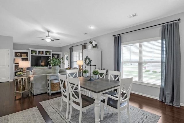2403 NE Oak Dr Unit 6, Ankeny, IA 50021 - dining room with wood finished floors, baseboards, a ceiling fan, and visible vents