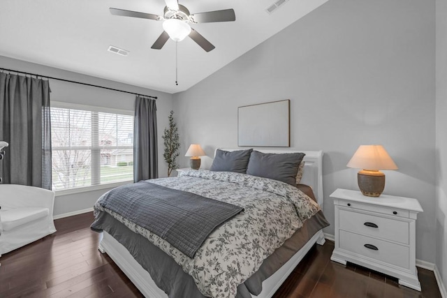 2403 NE Oak Dr Unit 6, Ankeny, IA 50021 - bedroom featuring visible vents, dark wood-style flooring, and vaulted ceiling