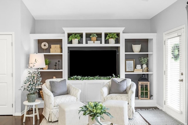 2403 NE Oak Dr Unit 6, Ankeny, IA 50021 - living room featuring baseboards and wood finished floors