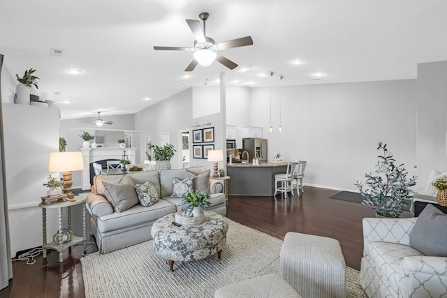 2403 NE Oak Dr Unit 6, Ankeny, IA 50021 - living room with ceiling fan, visible vents, recessed lighting, lofted ceiling, and dark wood-style floors