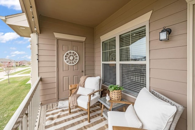 2403 NE Oak Dr Unit 6, Ankeny, IA 50021 - balcony featuring a porch