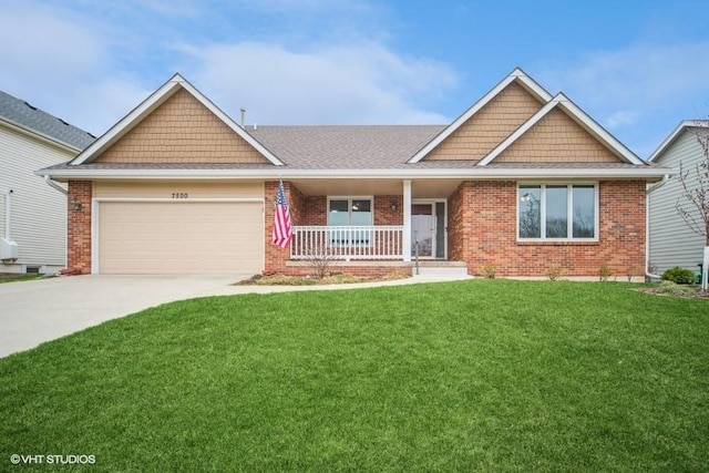 7500 Plum Dr, Urbandale, IA 50322 - craftsman-style home featuring a porch, an attached garage, a front yard, driveway, and brick siding