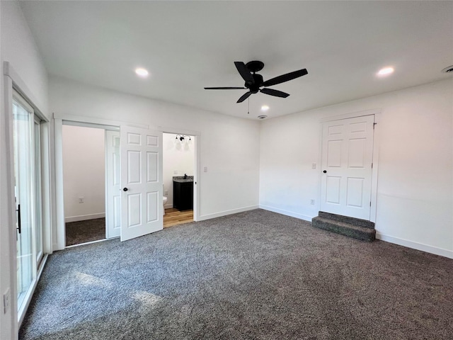 1402 E Marion St, Knoxville, IA 50138 - unfurnished bedroom featuring ceiling fan, recessed lighting, baseboards, and carpet floors