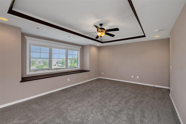 3555 NW 164th St, Clive, IA 50325 - empty room featuring a tray ceiling, ceiling fan, dark carpet, recessed lighting, and a smoke detector
