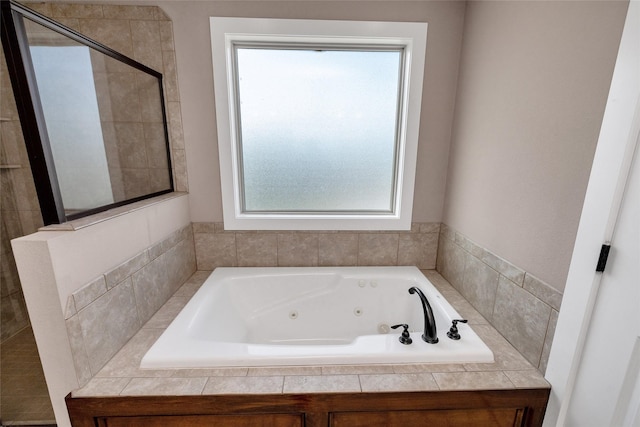 3555 NW 164th St, Clive, IA 50325 - bathroom with a jetted tub and a tile shower