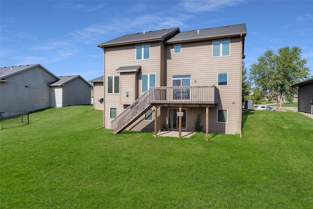 3555 NW 164th St, Clive, IA 50325 - rear view of property featuring stairway, a wooden deck, and a yard