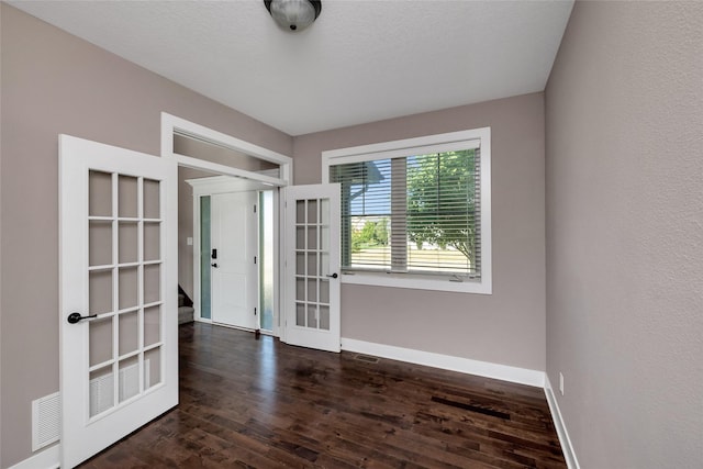 3555 NW 164th St, Clive, IA 50325 - empty room featuring baseboards and dark wood-style floors
