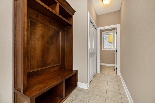 3555 NW 164th St, Clive, IA 50325 - mudroom with light tile patterned floors and baseboards