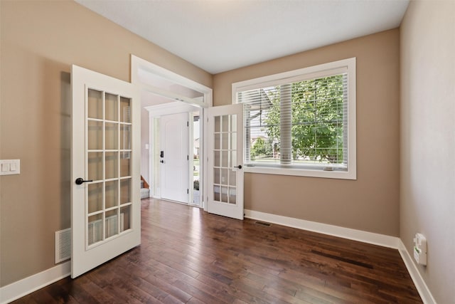 3555 NW 164th St, Clive, IA 50325 - entryway featuring french doors and dark wood-type flooring