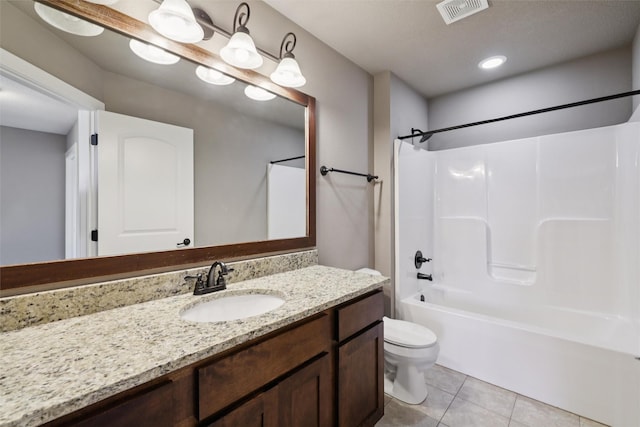 3555 NW 164th St, Clive, IA 50325 - bathroom with vanity, tile patterned flooring, tub / shower combination, and recessed lighting