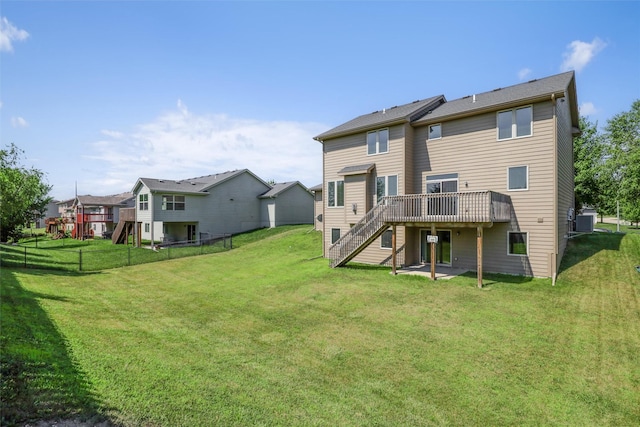 3555 NW 164th St, Clive, IA 50325 - rear view of house with stairway and a wooden deck