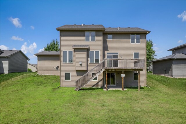 3555 NW 164th St, Clive, IA 50325 - rear view of house with a wooden deck, a yard, and stairs