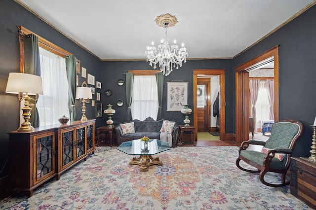 404 W Boston Ave, Indianola, IA 50125 - living area with a chandelier, plenty of natural light, and ornamental molding