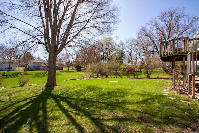 1412 Country Club Dr, Pella, IA 50219 - view of grassy yard featuring a wooden deck