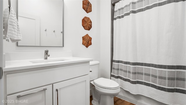 18170 79th Ln, Indianola, IA 50125 - full bath with a shower with shower curtain, vanity, and toilet