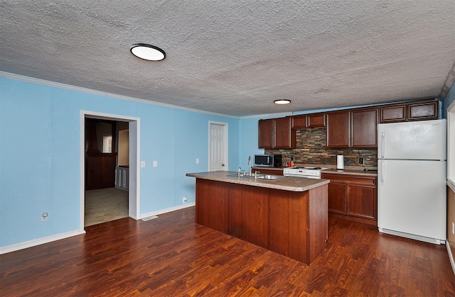 1632 Mamie Eisenhower Ave, Boone, IA 50036 - kitchen with white appliances, dark wood-style flooring, crown molding, light countertops, and a kitchen island with sink