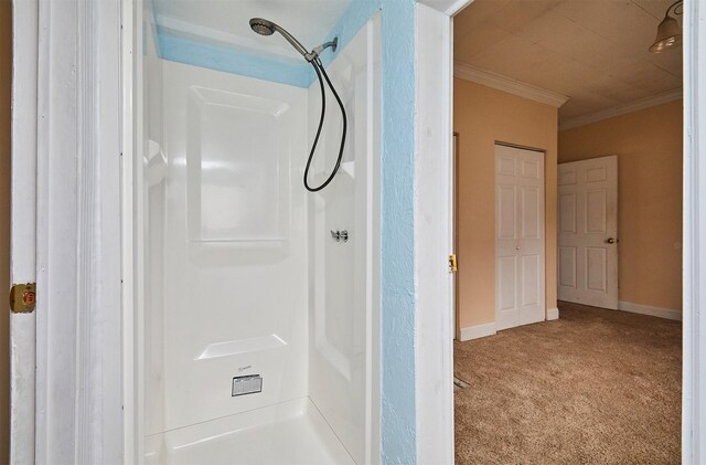 1632 Mamie Eisenhower Ave, Boone, IA 50036 - full bathroom with a shower, ornamental molding, and baseboards