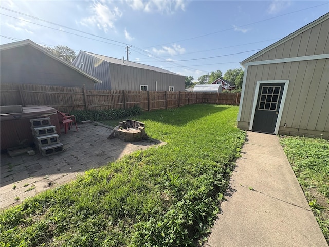 1632 Mamie Eisenhower Ave, Boone, IA 50036 - view of yard featuring a patio, an outdoor fire pit, and a hot tub