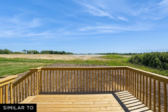 wooden terrace with a rural view
